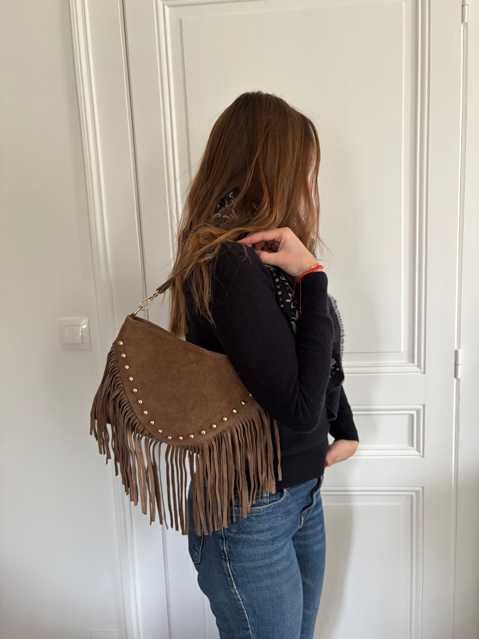 Petit sac à clous dorés